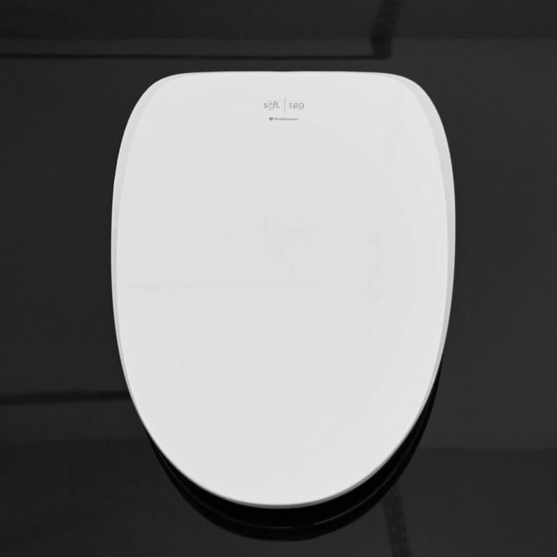 fluidmaster soft spa 9500 bidet seat top view on black table
