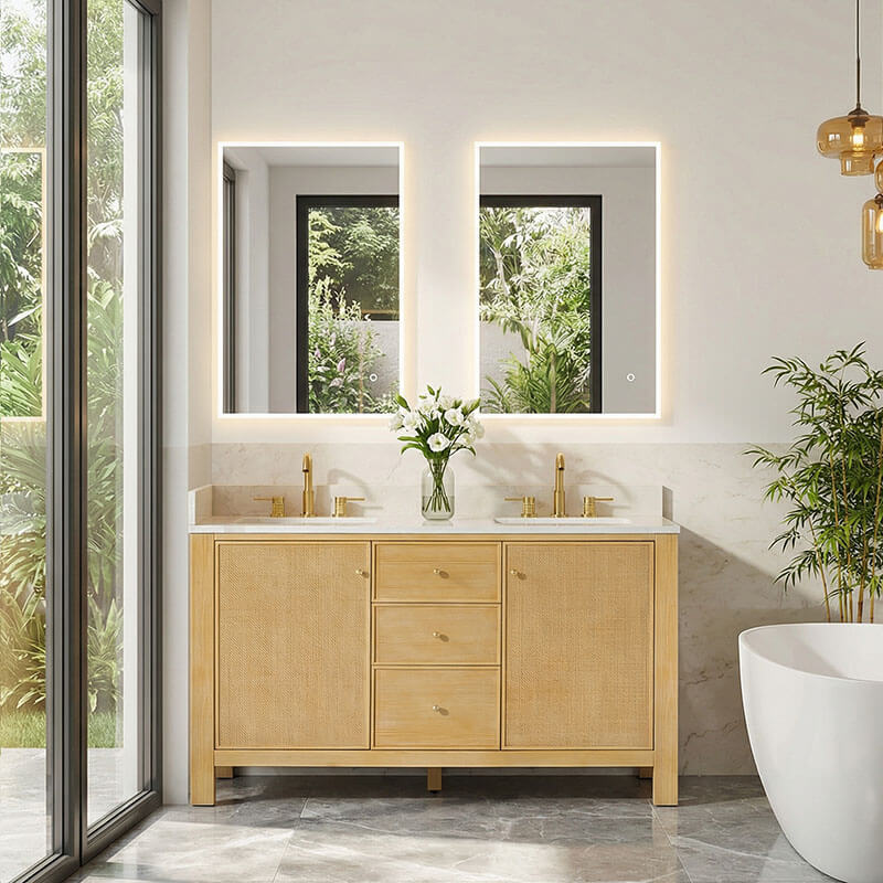 brown bathroom vanity with a tub and electric lighted mirrors above