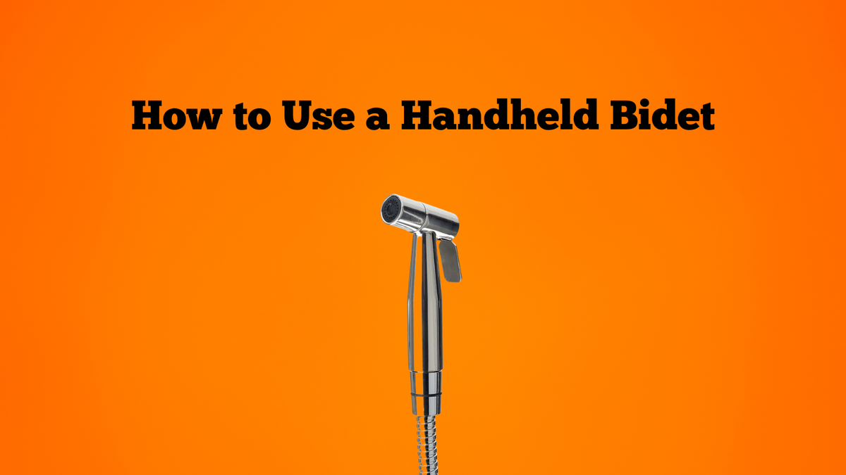 how to use a handheld bidet orange background bidet sprayer side view