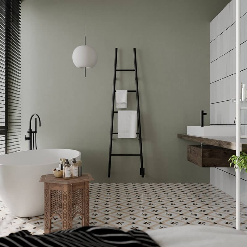 Amba Jeeves Model a Ladder in Matte Black Front View Between Bathtub and Basin
