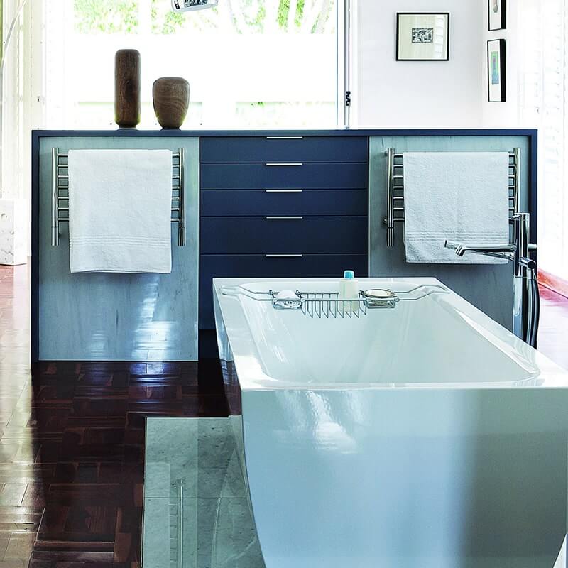 Amba Jeeves Model H Straight 7 Bar Hardwired Towel Warmer in Polished Stainless Near Bathtub