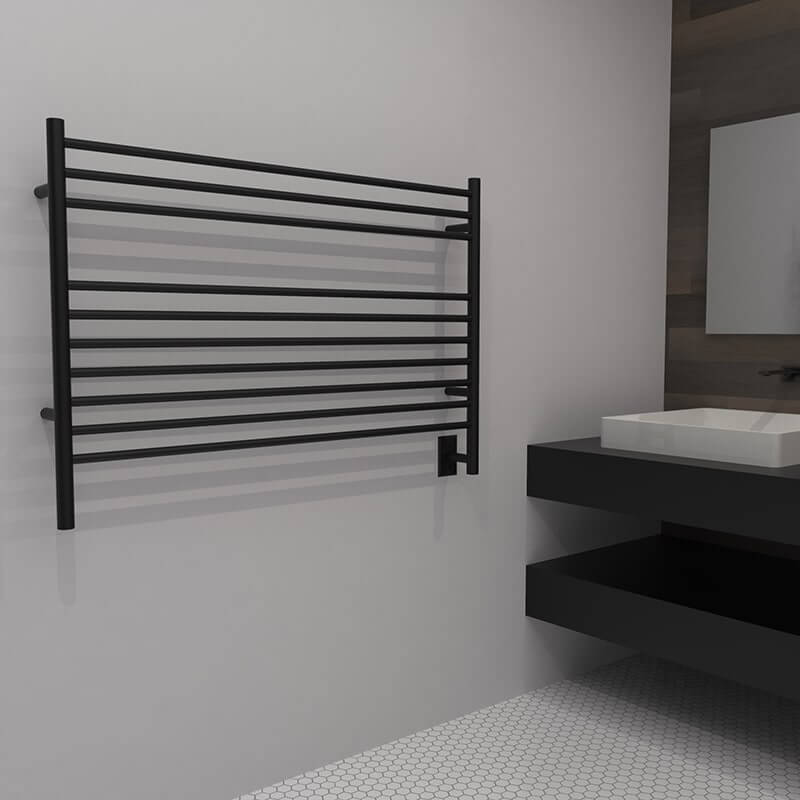 Amba Jeeves Model L Straight 10 Bar Hardwired Towel Warmer in Oil Rubbed Bronze Corner View Beside Vanity