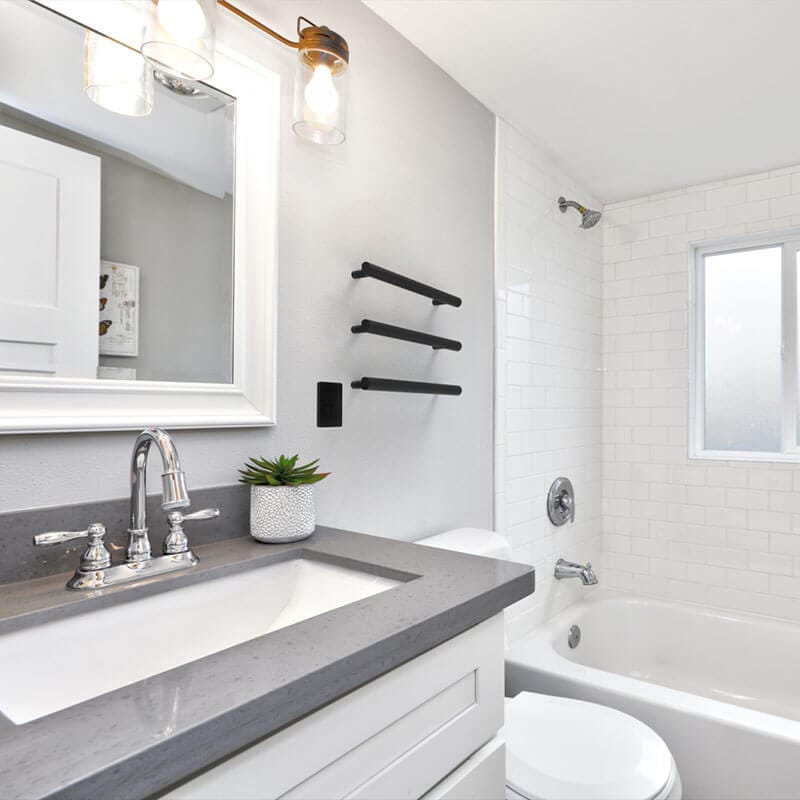 Amba Modello I Round 20 Hardwired Single Bar Matte Black Corner View Bathroom Set Up