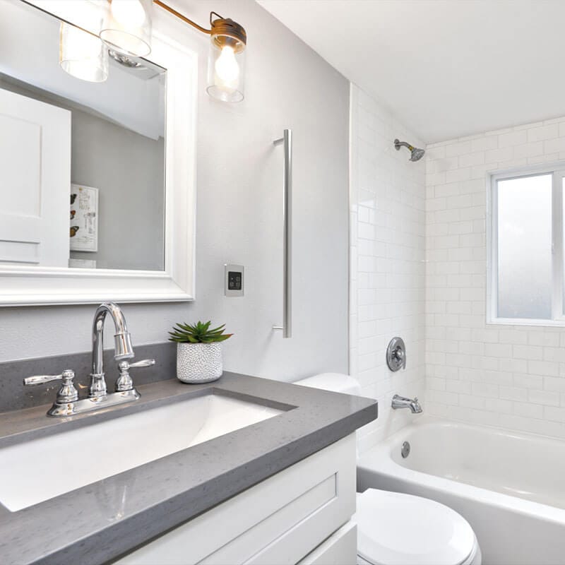 Amba Modello I Round 40 Hardwired Single Bar Matte Black Corner View Bathroom Set Up