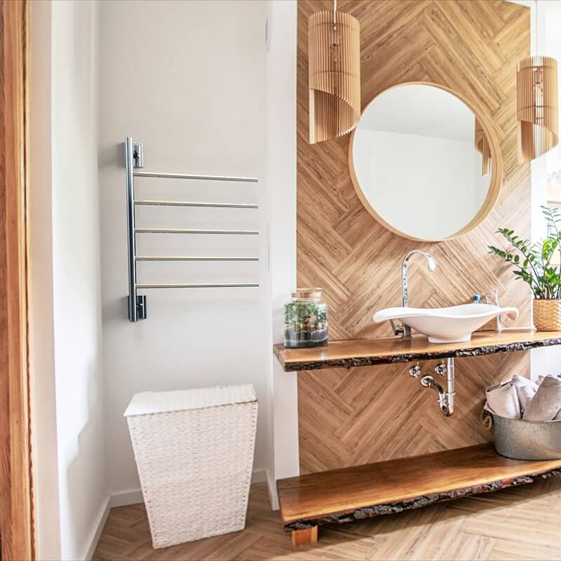 Amba Swivel Bar SB5 in Polished Stainless Beside Vanity Cabinet