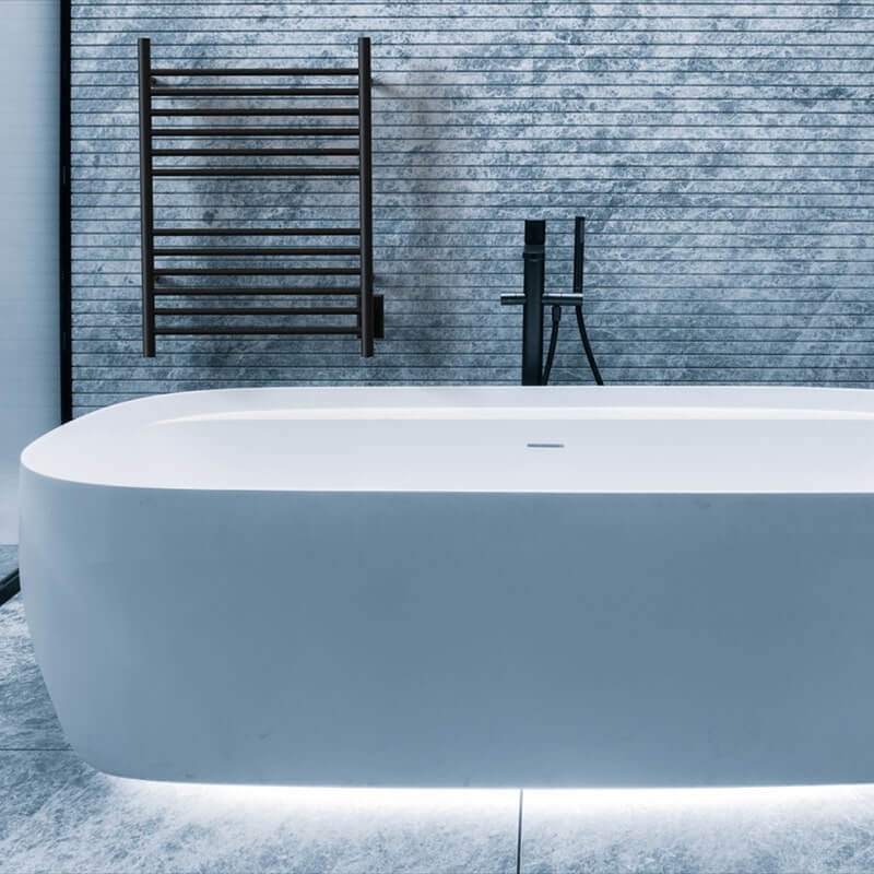 Cape Model 2332 12 Straight Bar Hardwired Towel Warmer in Matte Black Behind Bathtub