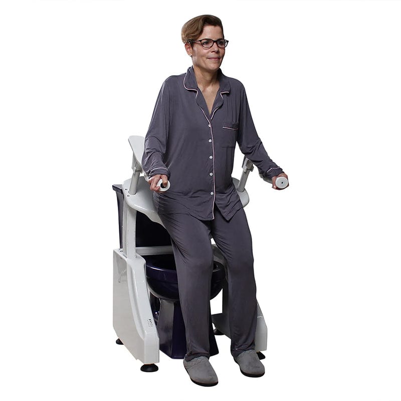 dignity lifts deluxe toilet lift dl1 with model on pajama