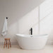 Dorrit 60" Freestanding Acrylic White Bathtub With Polished Chrome Trim and Matte Black Faucet Front View Lifestyle