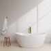 Dorrit 60" Freestanding Acrylic White Bathtub With Shiny White Trim and Brushed Gold Faucet Front View Lifestyle