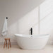 Dorrit 66" Freestanding Acrylic Bathtub White Bathtub With Shiny White Trim and Matte Black Faucet Front View Lifestyle