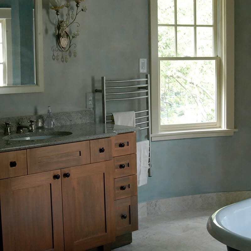 Jeeves Model C Curved Towel Warmer in Brushed Stainless Front View Lifestyle