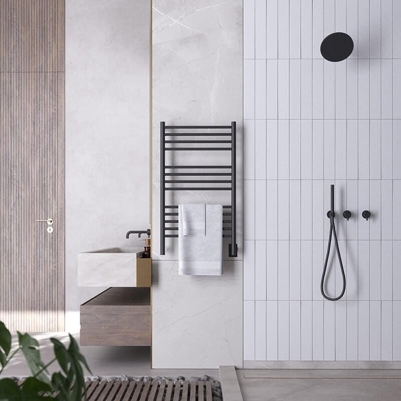 Jeeves Model C Straight 13 Bar Towel Warmer in Matte Black Front View Beside Shower