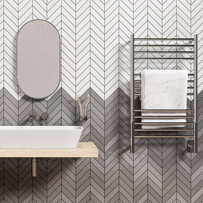 Jeeves Model C Straight 13 Bar Towel Warmer in Polished Stainless Front View Beside Vanity