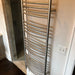 Jeeves Model D Curved 20 Bar Towel Warmer in Polished Stainless Top Side View