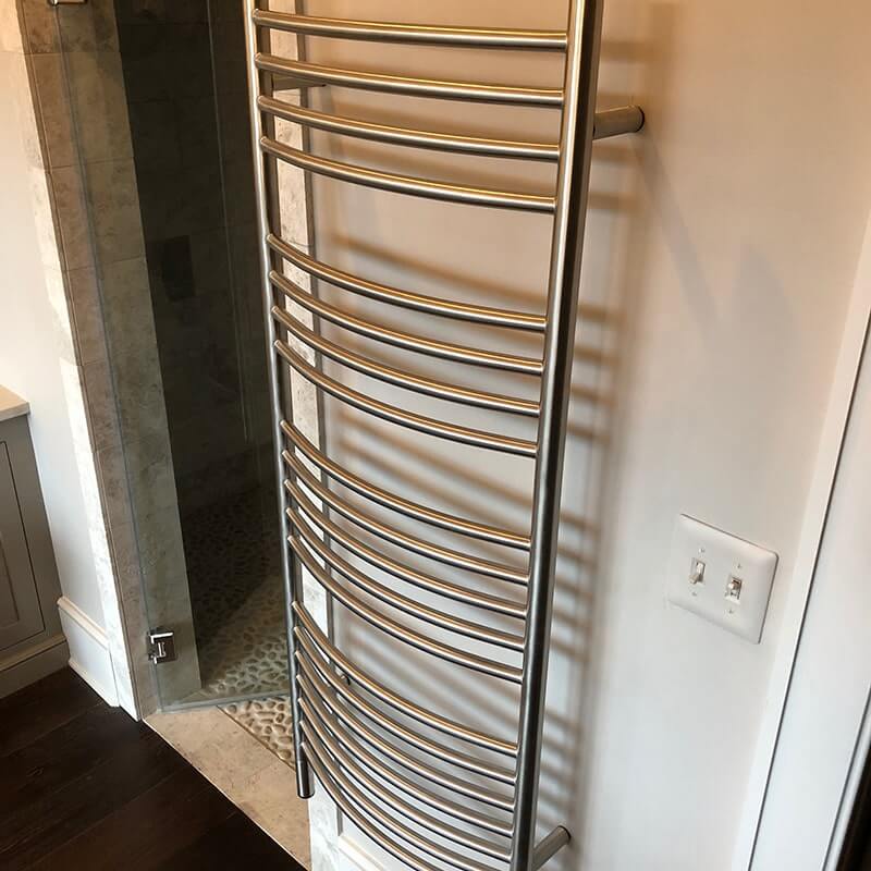 Jeeves Model D Curved 20 Bar Towel Warmer in Polished Stainless Top Side View