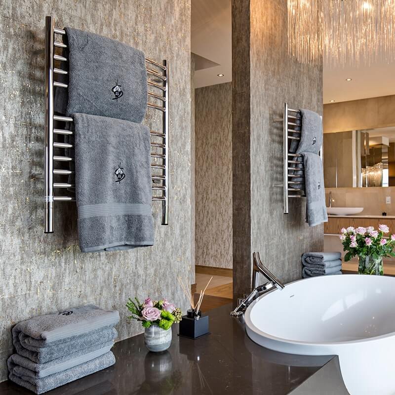 Jeeves Model E Curved in Polished Stainless Corner View Lifestyle