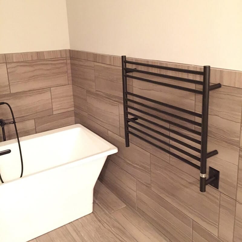 Jeeves Model K Straight 10 Bar Towel Warmer in Oil Rubbed Bronze Mounted Near Bathtub