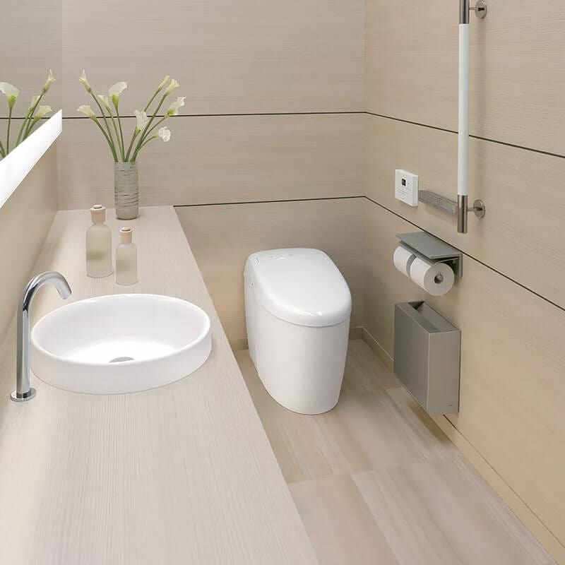 toto neorest rh dual flush 1.0 gpf 0.8 gpf integrated bidet toilet top front view lifestyle