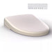 toto washlet s7a bidet toilet seat contemporary sedona beige corner view with remote up close