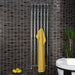 Tuzio Rosendal 16.5 X 59 Towel Warmer Chrome Front View With Yellow Towel