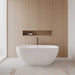 Wyndham Collection Brooklyn 60" Freestanding Acrylic White Bathtub With Shiny White Trim and Matte Black Faucet Lifestyle