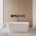 Wyndham Collection Carissa 67" Freestanding Acrylic White Bathtub With Polished Chrome Trim and Matte Black Faucet Lifestyle