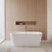 Wyndham Collection Carissa 67" Freestanding Acrylic White Bathtub With Shiny White Trim and Brushed Gold Faucet Lifestyle