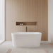 Wyndham Collection Ursula 59" Freestanding Acrylic White Bathtub With Shiny White Trim and Matte Black Faucet Lifestyle